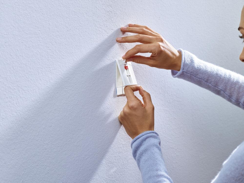 Tesa - Verstelbare zelfklevende spijker voor alle soorten muren (max 2x2kg)